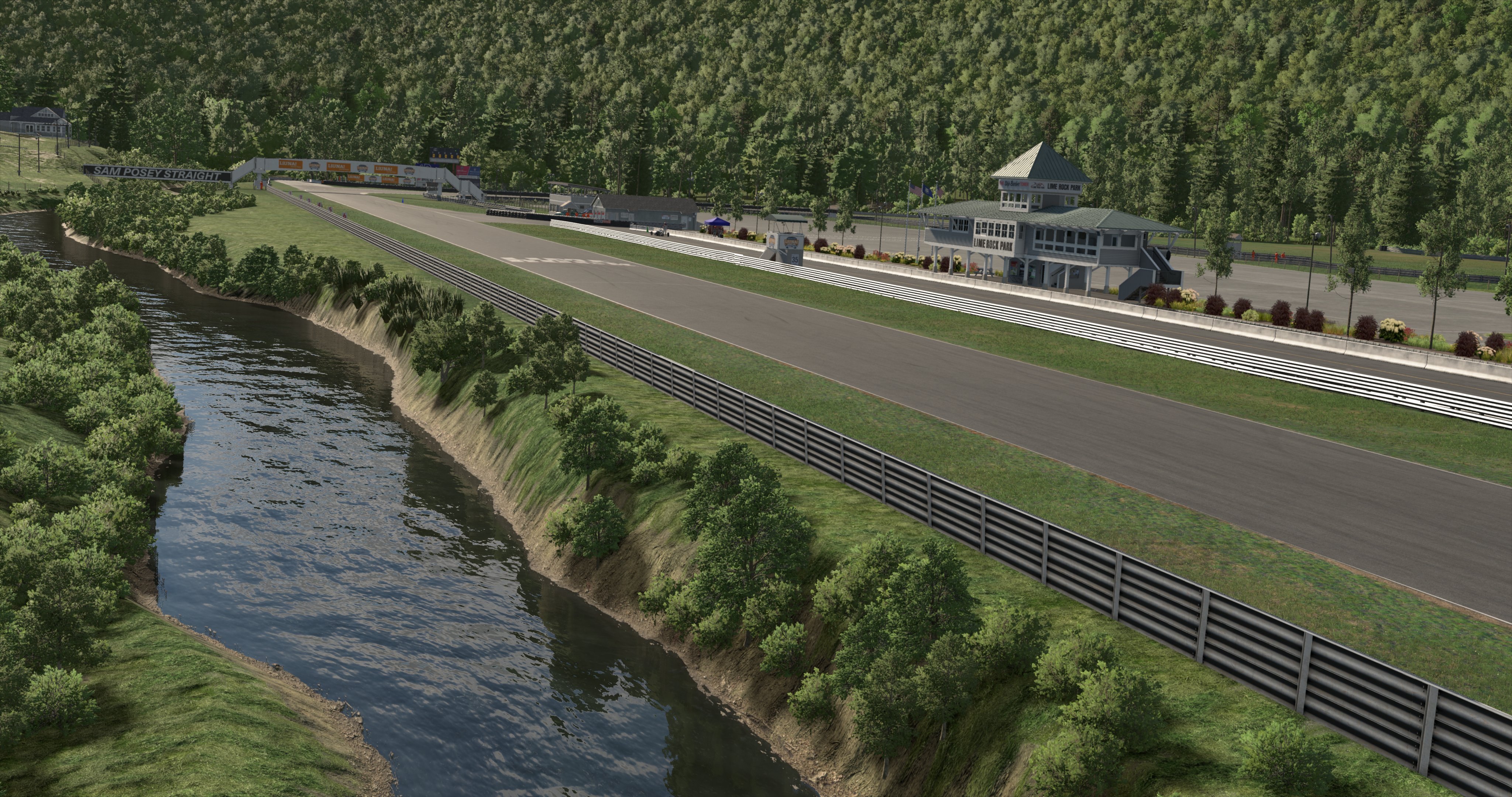 Empty iRacing track beside a river and a forest in the background
