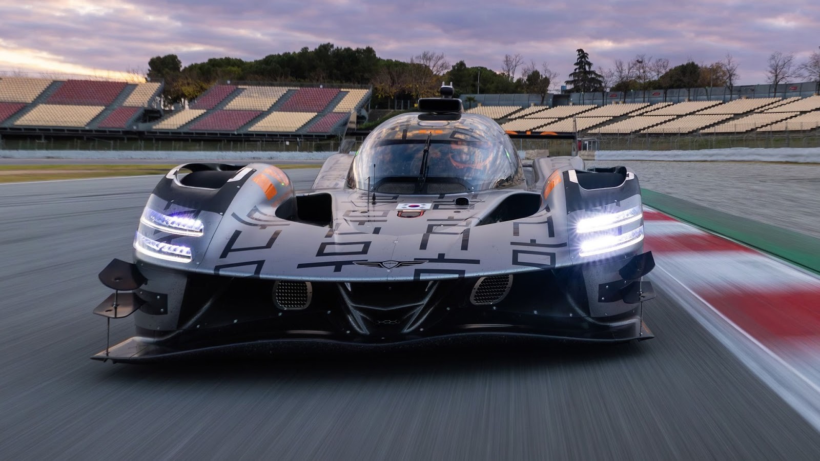 Front view of a black Genesis GMR-001 Hypercar